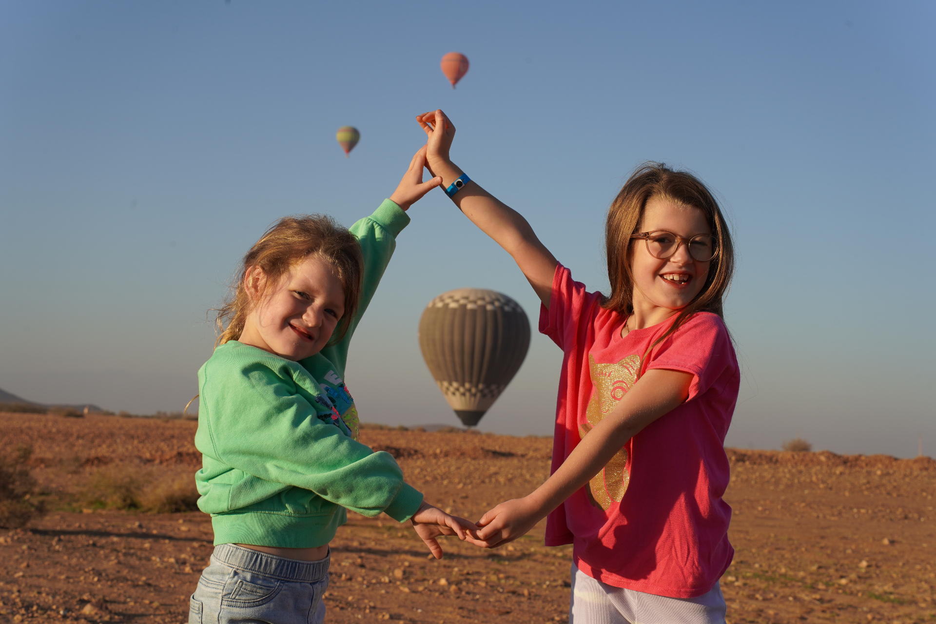 Children enjoying a hot air balloon experience in Marrakech